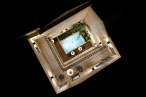 an overhead view of a bathroom with a television at Casa di Gaga in Rethymno