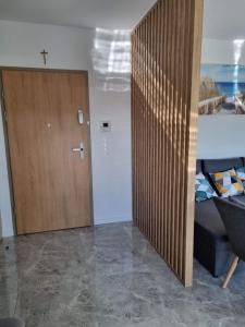 Posteľ alebo postele v izbe v ubytovaní Apartamenty Morze on Sea