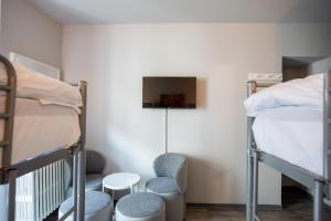 Cama o camas de una habitación en Hotel Bristol