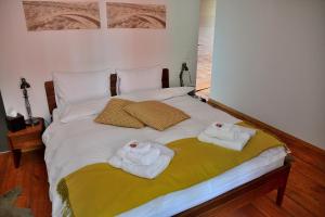 Voodi või voodid majutusasutuse Unique Hotel Fusio toas