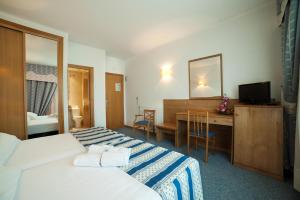 Кровать или кровати в номере Hotel Ría Mar