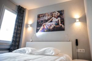 Cama o camas de una habitación en Hotel Bristol