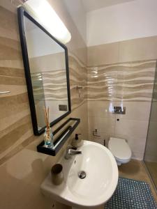 Koupelna v ubytování Kaldis Apartment + 16 fotografií