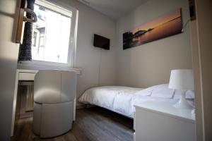 Cama o camas de una habitación en Hotel Bristol