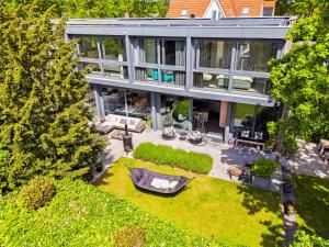 an aerial view of a house with a yard at Villa Modern Bergen in Bergen