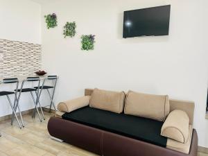 A television and/or entertainment centre at Attila Studio Apartments