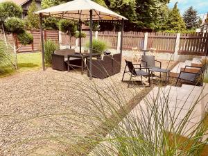 A garden outside Attila Studio Apartments