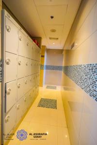 Fotografie z fotogalerie ubytování Alashrafia Saray- Homey 1BR apartment in Sport City v Dubaji