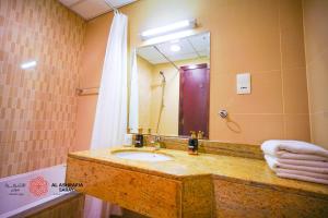Koupelna v ubytování Alashrafia Saray- Homey 1BR apartment in Sport City