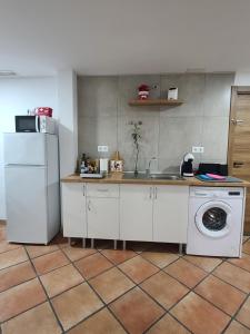 Kuchyňa alebo kuchynka v ubytovaní La Plumaria de Málaga
