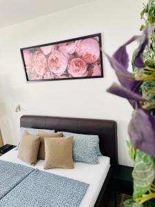 A bed or beds in a room at Attila Studio Apartments