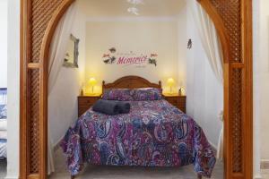 Posteľ alebo postele v izbe v ubytovaní Beachfront Bungalow