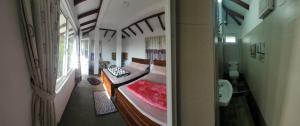 Uma cama ou camas num quarto em Acme Divine View
