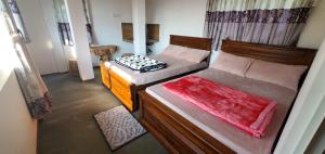 Uma cama ou camas num quarto em Acme Divine View