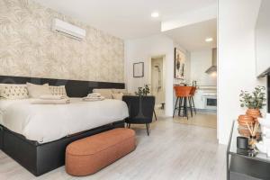 Posteľ alebo postele v izbe v ubytovaní Chic intimate studio in the heart of Malaga by REMS