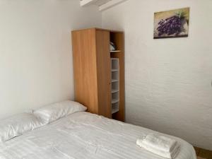 A bed or beds in a room at Holiday Home - Son Vida