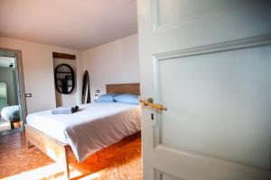 Postel nebo postele na pokoji v ubytování Il Giardino di Nesso