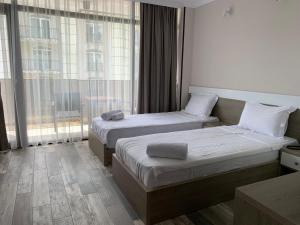 Postel nebo postele na pokoji v ubytování Green Rock