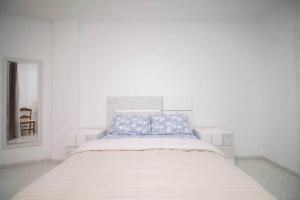 Posteľ alebo postele v izbe v ubytovaní Duquesa 603 By IVI Real Estate