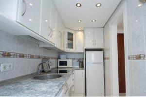 Kuchyňa alebo kuchynka v ubytovaní Duquesa 603 By IVI Real Estate