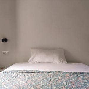 Postel nebo postele na pokoji v ubytování La Casita Verde