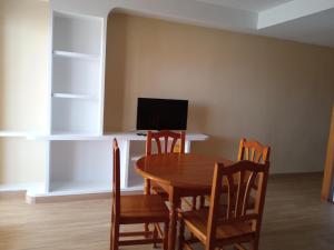 Televízia a/alebo spoločenská miestnosť v ubytovaní Apartamentos Satse Moncofa