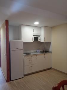 Kuchyňa alebo kuchynka v ubytovaní Apartamentos Satse Moncofa