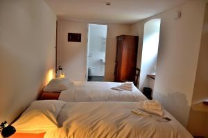 Voodi või voodid majutusasutuse Unique Hotel Fusio toas