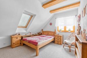 Postel nebo postele na pokoji v ubytování Chata Pohádka Vyšní Lhoty