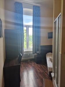 Letto o letti in una camera di Hotel Am Stuttgarter Eck