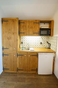 Dapur atau dapur kecil di APARTMÁNY PAUSRAM