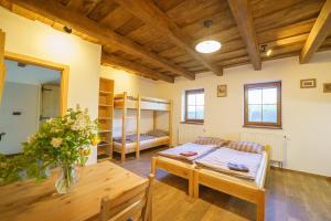 Postel nebo postele na pokoji v ubytování APARTMÁNY PAUSRAM + 14 fotografií