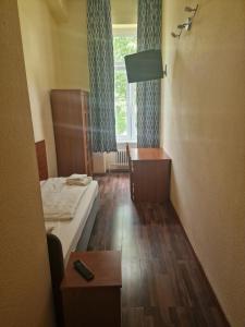 Letto o letti in una camera di Hotel Am Stuttgarter Eck