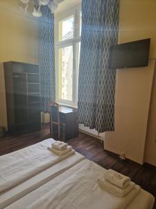 Letto o letti in una camera di Hotel Am Stuttgarter Eck