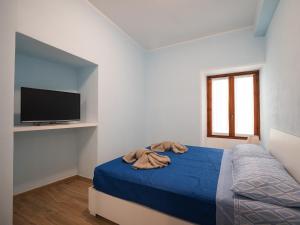 Postel nebo postele na pokoji v ubytování Camelia House