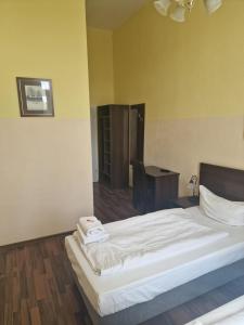 Letto o letti in una camera di Hotel Am Stuttgarter Eck