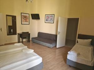Letto o letti in una camera di Hotel Am Stuttgarter Eck