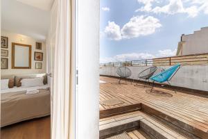 Posteľ alebo postele v izbe v ubytovaní Top Ático Plaza del Arenal - Gran terraza - Vistas - Solarium
