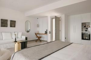 Cama ou camas em um quarto em Grace Mykonos
