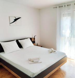 Posteľ alebo postele v izbe v ubytovaní Apartment Coco
