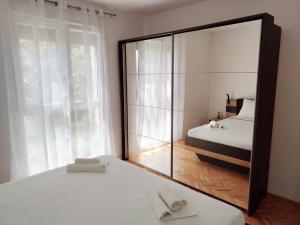 Posteľ alebo postele v izbe v ubytovaní Apartment Coco