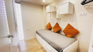 En eller flere senge i et værelse på Apartamento en Cambrils + 41 billeder