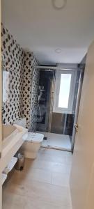 Łazienka w obiekcie Apartamentos La Quinta