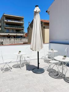 Balkón nebo terasa v ubytování Holmann Suite & Rooms