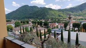 a view of a town with trees and a mountain at Casa Daniela in Bagni di Lucca