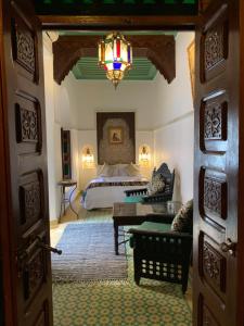 Postel nebo postele na pokoji v ubytování Riad Malida Marrakech