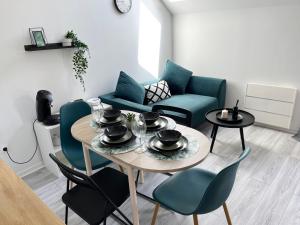 Posezení v ubytování COSY TORCY charmant 2 pièces entre Paris et Disney + 8 fotografií