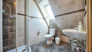 Kúpeľňa v ubytovaní VisitZakopane - City Apartments + 23 fotografií