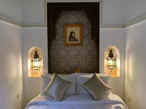 Postel nebo postele na pokoji v ubytování Riad Malida Marrakech