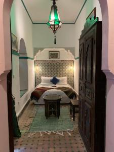 Postel nebo postele na pokoji v ubytování Riad Malida Marrakech